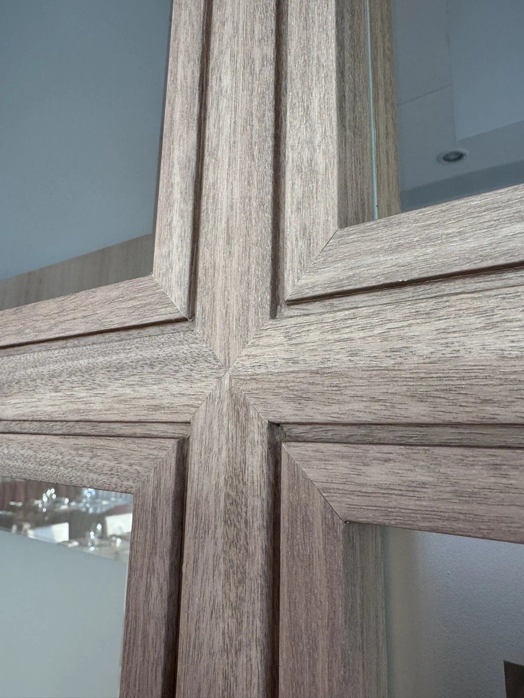 Where the clad profiles of the door meet